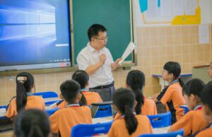 The Court Rejected the Teacher-Training Grant Cuts. It Cannot Rebuild the Pipeline. Teacher instructing attentive students in a classroom setting, fostering education and learning.