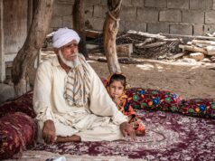 The Arabian Nights and the Medical Politics of Translation Elderly man and child sitting outdoors in traditional setting, Sistan and Baluchestan.