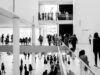 The Lucas Museum Wants Popular Images Taken Seriously. Now It Must Judge Them. A dynamic black and white image of people in a modern museum setting.
