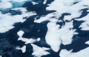 The Arctic Did Not Set a Summer Record. That Is Not a Recovery. Aerial view of striking ice patterns on a frozen lake in Norilsk, Russia. Captivating and abstract.