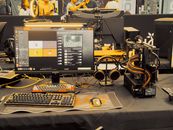 GDEX Is Building the Local Infrastructure the Game Industry Forgot Modern gaming gear setup on display at a tech expo.