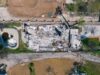 Los Angeles Fire Survivors Are Losing Case Managers Before Recovery Is Done Aerial shot of a house destroyed by wildfire in Altadena, California.