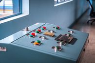 Zero Trust Has Reached the Control Room. The Hard Part Is Not the Network. Close-up of an industrial control panel with colorful buttons in a factory setting.