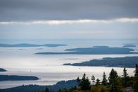 A Missing Marker Is Not a Small Omission Breathtaking view of Maine islands from Cadillac Mountain, featuring an overcast sky and serene coastal landscapes.