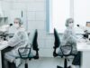 The New NIH Women’s Health Division Has a 90-Day Deadline. Its Authority Matters More Than Its Name. Two female scientists working with microscopes in a laboratory setting.