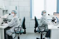The New NIH Women’s Health Division Has a 90-Day Deadline. Its Authority Matters More Than Its Name. Two female scientists working with microscopes in a laboratory setting.